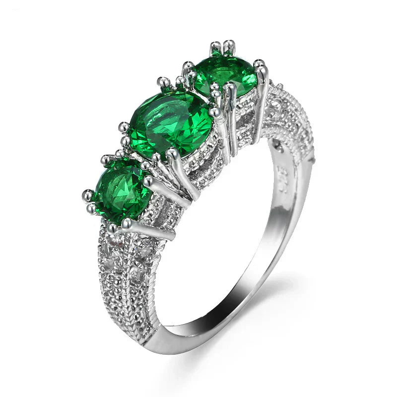 Dahlia | Timeless Ring with Sparkling Emerald Stones
