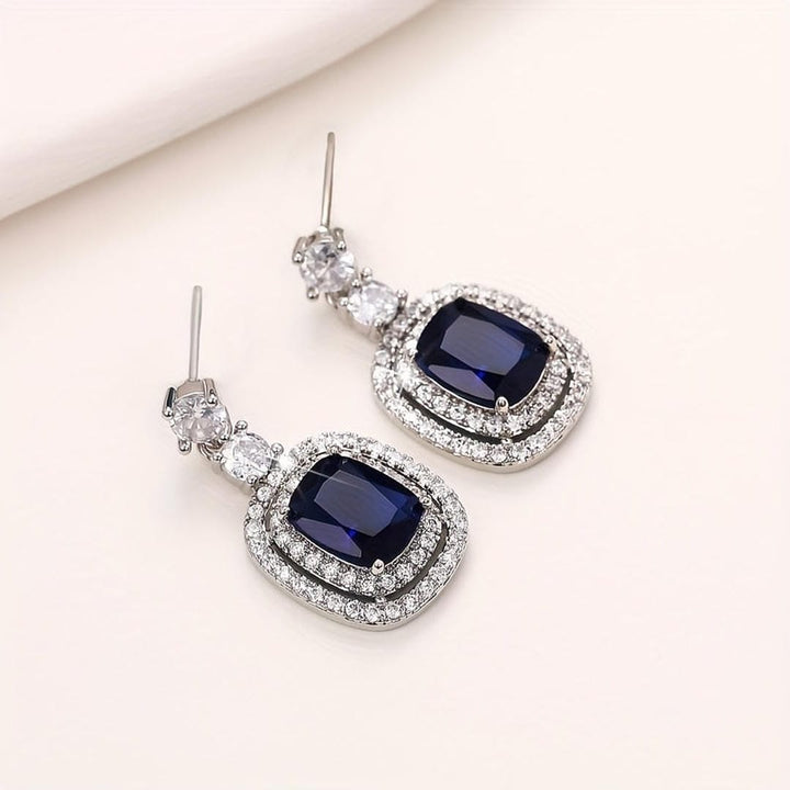 Freya | Oval Sapphire Paved Zirconia Earrings