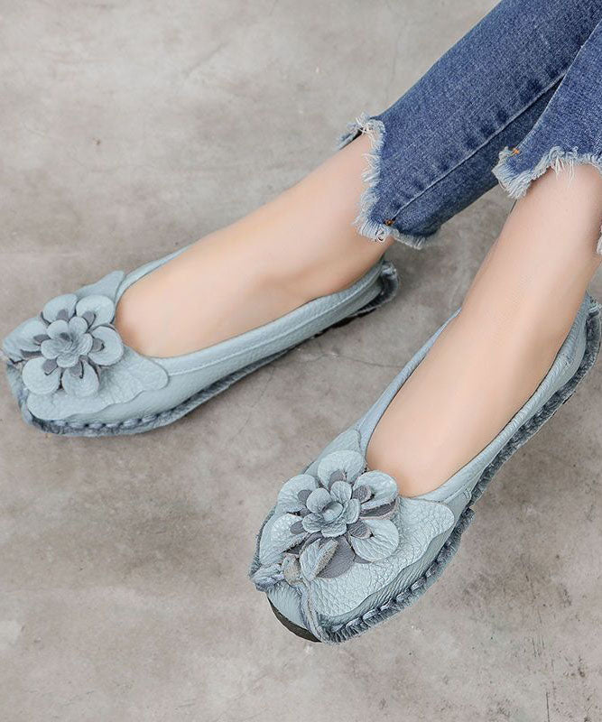 Blue Cowhide Floral Penny Loafers