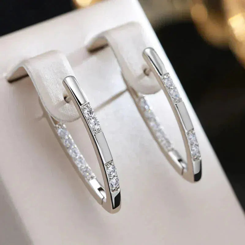 Ruby | Sophisticated earrings with zirconium stones